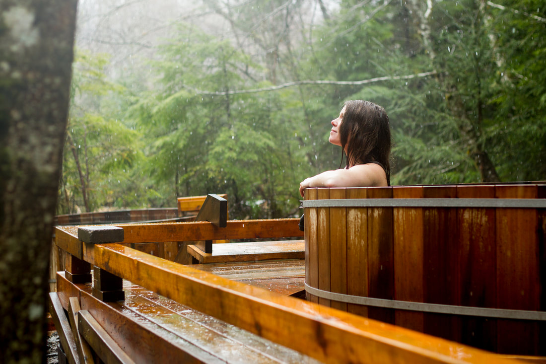 Woman relaxing in hot springs